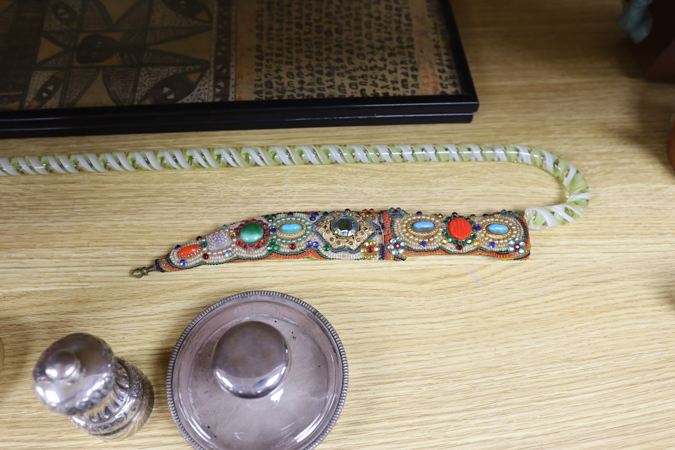 A miscellaneous selection of items, to include a Mappin and Webb Peugeot grinder, an Egyptian-style lady dancing on a plinth, a beaded dagger, etc.